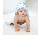 Baby Boy wearing Aden + Anais Hooded Muslin Towels - 2 Pack - In a box - Space Explorers. Available at www.tenlittle.com