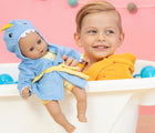 Boy in bath tub playing Adora BathTime Baby Doll - Dinosaur - Available at www.tenlittle.com