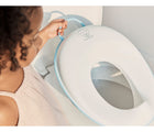 Baby Holding in a toilet bowl - BabyBjorn Toilet Training Set - White/Turquoise - Available at www.tenlittle.com