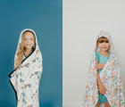 2 Girls using Copper Pearl Big Kid Knit Hooded Towel -Autumn and farm- Available at www.tenlittle.com