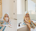 Baby using Copper Pearl Hooded Knit Towel - Duck - Available at www.tenlittle.com