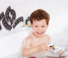 Boy playing at the bath tub Edushape Bath Foam Toys - Wheels - Available at www.tenlittle.com