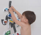 Boy playing Edushape Bath Foam Toys - Wheels - Available at www.tenlittle.com