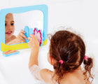 Little girl playing in shower Edushape Look & Sea Mirror - Available at www.tenlittle.com