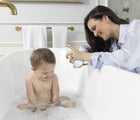 Mom bathing baby using EllaOla Superfood Baby Shampoo & Body Wash - Available at www.tenlittle.com