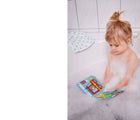 Baby Girl reading HABA Color changing bath book - Firefighters - available at www.tenlittle.com