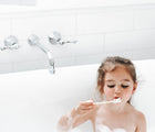 Little Girl in a tub playing Jack N' Jill Bubble Bath & Magic Bubble Wand - Available at www.tenlittle.com