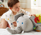 Baby Playing with Plan Toys Elephant Activity Pillow - Available at www.tenlittle.com
