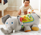 Close up baby playing with Plan Toys Elephant Activity Pillow - Available at www.tenlittle.com