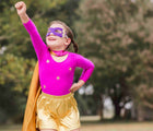 Child wearing Bailey & Ava Superhero Leotard Skirt Set-Pink. Available at www.tenlittle.com