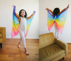 Kid playing and wearing Sarah's Silks Fairy Wings - Rainbow - Available at www.tenlittle.com