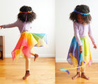 Girl playing Sarah's Silks Princess/Prince Dress Up Set - Rainbow- Available at www.tenlittle.com