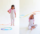 Girl playing Sarah's Silks Rainbow Streamer - 5 Pack - Available at www.tenlittle.com