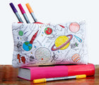 eatsleepdoodle Space Pencil Case Color and Learn on a book. Available from www.tenlittle.com.