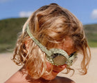 Child wearing the Sunnylife Crocodile Swim Goggles. Available from www.tenlittle.com