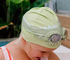 Child at the pool wearing the Sunnylife Crocodile Swimming Cap. Available from www.tenlittle.com