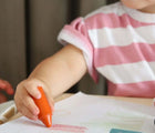 Child drawing with Honeysticks Natural Beeswax Crayones - Set of 10. Available at www.tenlittle.com