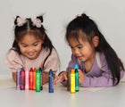 Kids drawing with Honeysticks Natural Beeswax Crayons Jumbos - Set of 12. Available at www.tenlittle.com