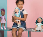 Child Holding Adora Be Bright Color Changing Hair Doll Melissa- Available at www.tenlittle.com