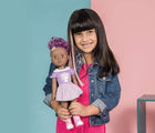 Child Holding Adora Be Bright Color Changing Hair Doll Savannah- Available at www.tenlittle.com