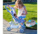 Child playing Adora Color Changing Doll Stroller with doll inside- Available at www.tenlittle.com