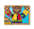 Melissa & Doug Basic Skills Puzzle Board packaging. Available from www.tenlittle.com.