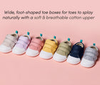 Group shot of Ten Little First Walkers featuring wide, foot-shaped toe boxes for toes to splay naturally and a soft, breathable cotton upper - Assorted Colors. Available at www.tenlittle.com