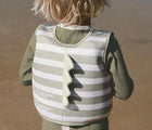 Close up of child wearing the Sunnylife Crocodile Float Vest. Available from www.tenlittle.com