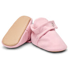 Top and bottom grippy outsole view of Ten Little Everyday Baby Booties - Soft Pink. Available at www.tenlittle.com