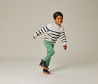 Boy wearing Ten Little Chelsea Boots in Metallic Gray. Available at www.tenlittle.com