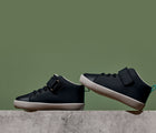 Side view of Ten Little Mid Top Sneakers - Matte Black. Available from www.tenlittle.com