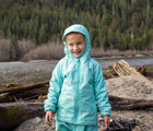 Girl in the lake wearing Therm SplashMagic Eco Fleece Rain Jacket - Aqua - Available at www.tenlittle.com