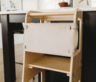 Piccalio's Kitchen Tower Safety Net fastened to the Convertible Kitchen Tower. Available from www.tenlittle.com