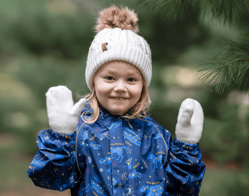 Little girl deals mittens