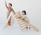 Children playing on the Piccalio Climber Pikler Triangle Set. Available from www.tenlittle.com