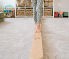 Close up of child balancing on the Piccalio Wooden Balance Beam. Available from www.tenlittle.com