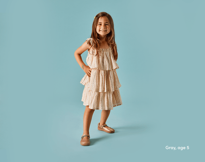 Girl age 5 wearing Ten Little Mary Janes - Rose Gold. Available at www.tenlittle.com