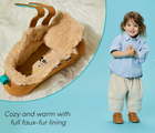 Split view of cozy and warm full faux-fur lining and child wearing Ten Little Cozy Suede Sneakers - Toffee Brown. Available at www.tenlittle.com