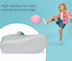 Split view of high-traction, non-skid outsole to prevent slips and child playing with balloon wearing Ten Little Eco Canvas Mary Janes - Blue Seersucker, Pink Seersucker. Available at www.tenlittle.com