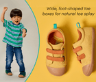 Split view of child wearing Ten Little Eco Corduroy Sneakers and top and side view of shoes featuring wide, foot-shaped toe boxes for natural toe splay - Green / Navy, Yellow / Orange. Available at www.tenlittle.com