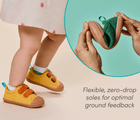 Split view of child wearing Ten Little Eco Corduroy Sneakers and person flexing zero-drop sole designed for optimal ground feedback - Yellow / Orange, Green / Navy. Available at www.tenlittle.com
