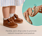 Split view of child wearing Ten Little Mini Mary Janes and person flexing zero-drop sole which promotes natural movement and posture - Caramel Brown, Champagne Gold. Available at www.tenlittle.com