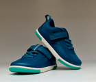 Front and side view of stacked Ten Little MotionX Sneakers - Cosmic Blue. Available at www.tenlittle.com