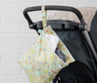 Bumkins Wet/Dry Bag - Camp Gear attached to stroller. Available from www.tenlittle.com