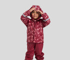 Child with hood on wearing Reima Fleece-Lined Rubber Rain Jacket - Koski - Jam Red. Available at www.tenlittle.com