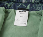 Close up interior ID tag of Reima Fleece-Lined Rubber Rain Jacket - Koski - Navy. Available at www.tenlittle.com
