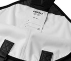 Close up interior ID tag of Reima Waterproof Rain Pants - Black. Available at www.tenlittle.com