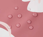 Close up waterproof material of Reima Waterproof Rain Jacket - Vesi - Rose Blush. Available at www.tenlittle.com