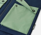 Close up flap pocket of Reima ReimaTec Waterproof Shell Jacket - Sysma - Navy. Available at www.tenlittle.com
