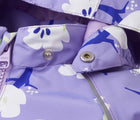 Close up hood snap buttons of Reima Reimatec Waterproof Jacket - Hete - Blooming Lilac. Available at www.tenlittle.com
